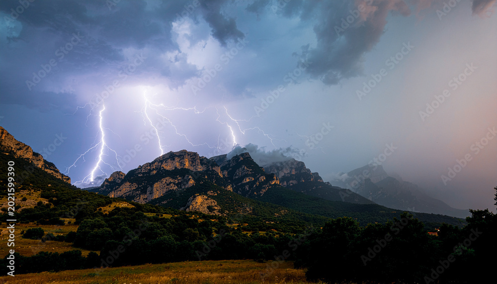 Fototapeta premium storm clouds over the mountains