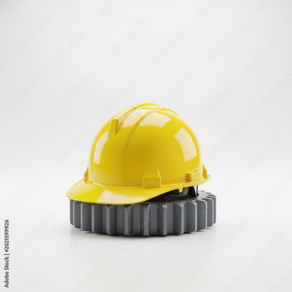 Fototapeta premium Yellow hard hat sits on a gear