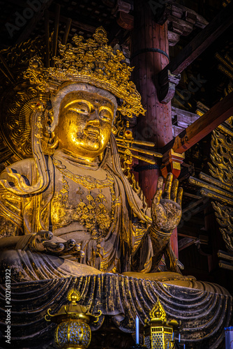 Golden buddha statue in Todai-ji Temple, Nara, Japan
