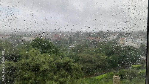 View of rain outside through a window.