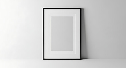 Minimalist vertical black frame mockup on white wall with minimalist interior decoration background template copy space vertical