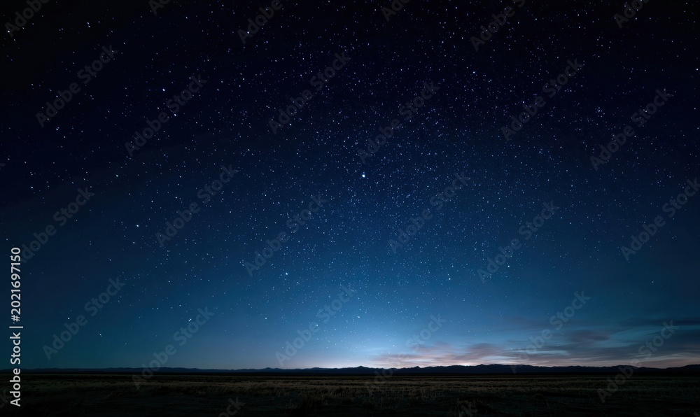 Fototapeta premium Night sky full of stars, horizon glowing blue