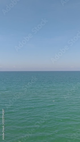 Aerial drone view of over tropical sea waves. Royalty high-quality free best stock of beautiful wave calm, blue water surface background for rest relax on vacation, journey, trip. Turquoise background