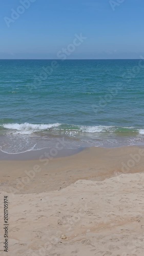 Summer seascape beautiful waves, blue sea water in sunny day. Royalty high-quality free best stock of tranquil beach with turquoise waves splashing, sand shore. Aerial view, tropical nature background
