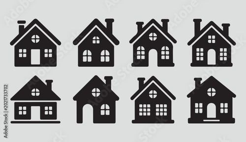 Set of eight black house icons featuring different residential building designs and cottage styles for real estate and construction projects