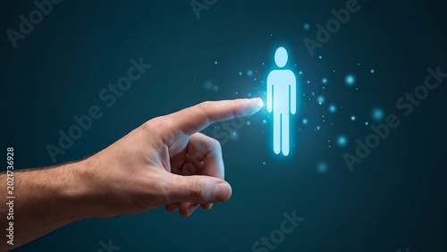 Hand touching a digital glowing human icon, representing selection, technology, and human resources