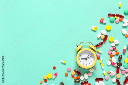 Yellow alarm clock with dif...