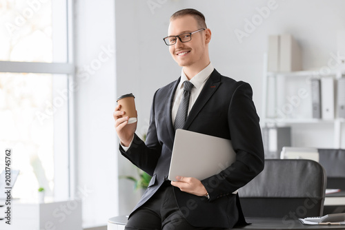 Handsome businessman in eye...