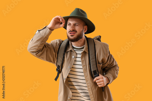 Young male tourist looking ...