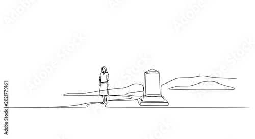 Fotografie Woman standing by gravestone in desolate landscape, minimalist line art