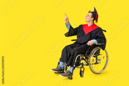 Male graduate in wheelchair...