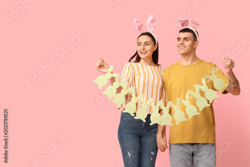 Happy young couple with Eas...
