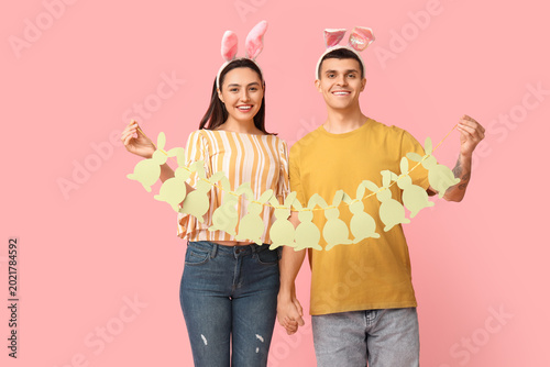 Happy young couple with Eas...