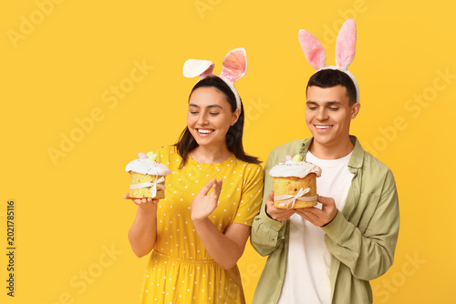 Happy young couple with Eas...