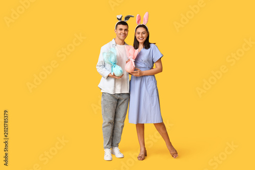 Happy young couple with Eas...
