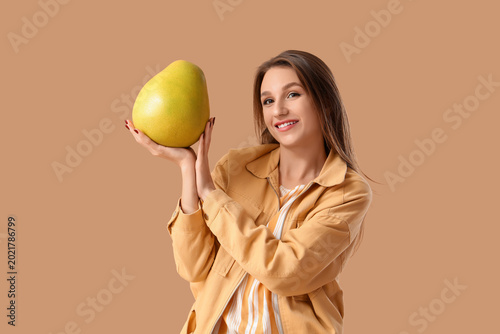 Smiling young woman with po...