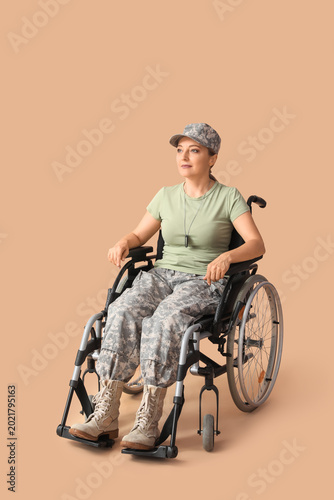 Female soldier in wheelchai...
