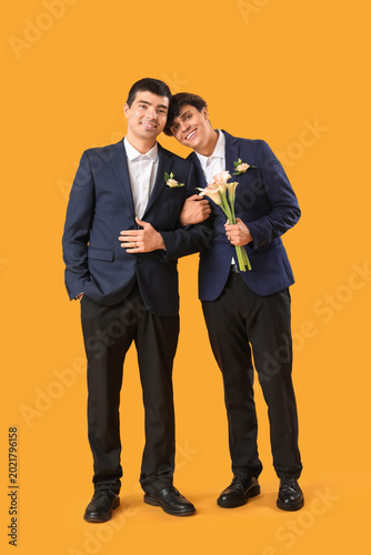 Married gay couple with flo...