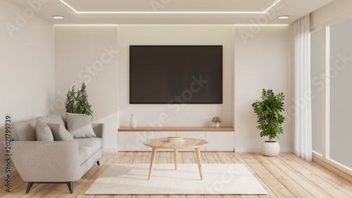 Modern minimalist living room interior with blank TV screen on white wall and wooden furniture.3d rendering.