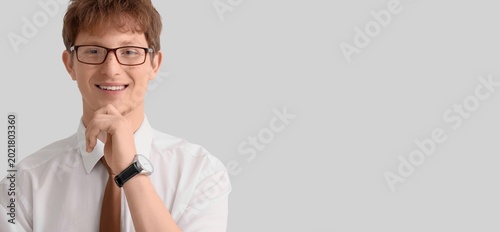 Young redhead businessman o...