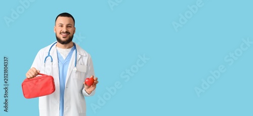 Male doctor holding first a...