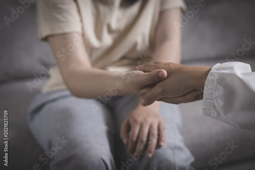   A patient for treatment encouragement Love and family problems, bipolar, depressed patients prevent suicide. Psychologist listening to the problem of a patient with mental health problems.