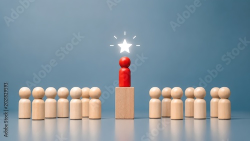 Outstanding red wooden peg figure standing on a block with glowing star icon among a crowd representing leadership and top talent concept