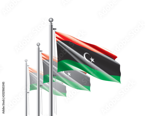 Cuadro en lienzo Brightly shining Libyan flags wave proudly on tall masts during official celebra