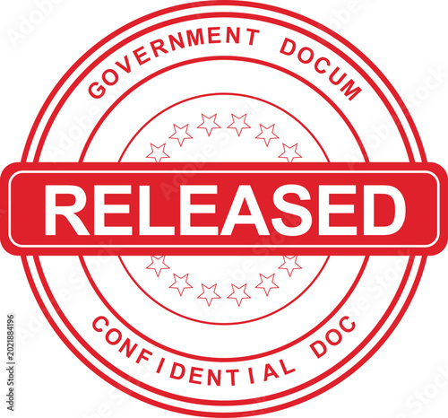 A red stamp with the word RELEASED on a document marking it as government confidential documentation officially released.