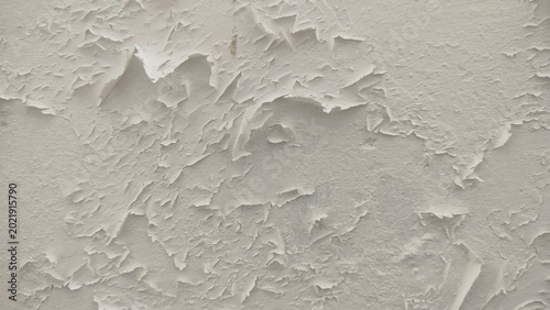 Fotografie The surface or background of an old white wall with peeling paint