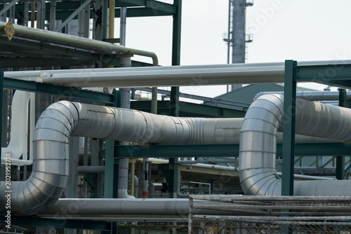 Canvastavla Refinery pipeline rack with insulated pipe bends supports petrochemical operatio