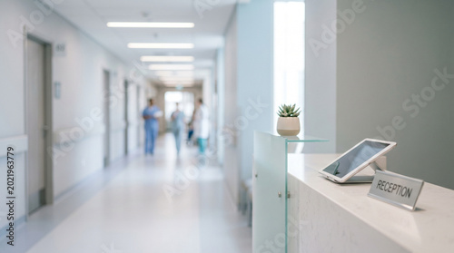 Clean modern hospital hallway with bright lighting and healthcare facility interior design.