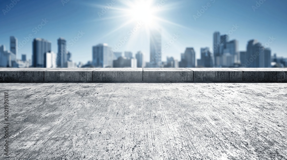 Fototapeta premium Sunny urban cityscape vista from a concrete rooftop with modern skyscrapers and bright sky