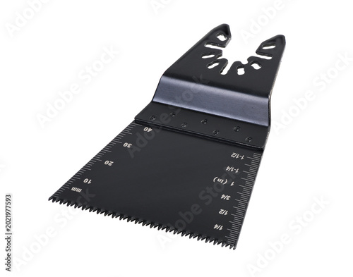 Fotografie New oscillating multi-tool saw blade isolated on white background