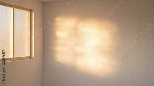 Cuadro en lienzo Minimalist empty white room interior featuring warm bright sunlight reflection s