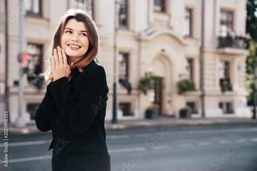 Tablou pe pânză Portrait of young beautiful brunette woman wearing nice trendy suit black jacket clothes