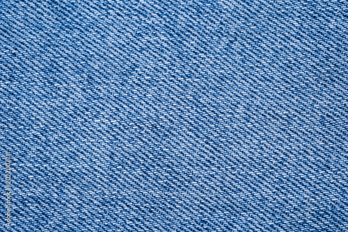 Fotografie Close up of blue denim fabric texture