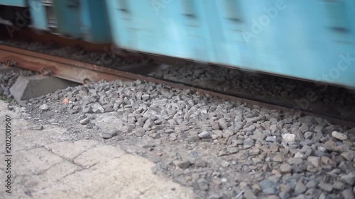 Close-Up Train Wheels Passing on Railway Tracks