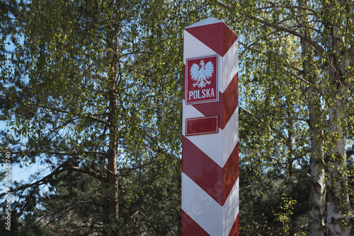 STATE BORDER POST - The Polish border is marked with posts in national colors 