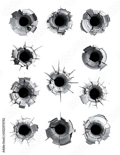 Bullet holes in a white background.