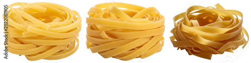 Photos Three nests of fettuccine pasta isolated on a transparent background