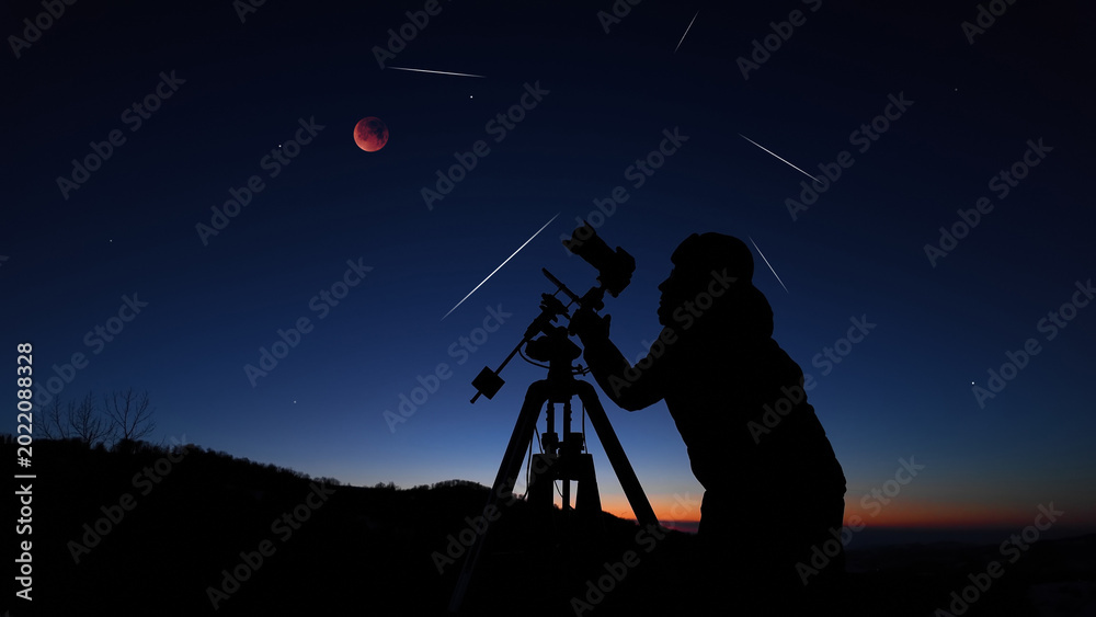 Fototapeta premium Amateur astronomer observing stars, planets, Moon eclipse and other celestial objects.
