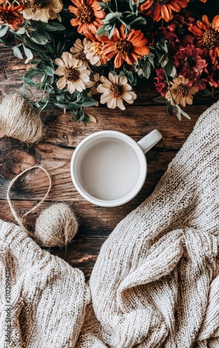 Cozy Morning Scene with Warm Cup of Coffee and Beautiful Autumn Flowers