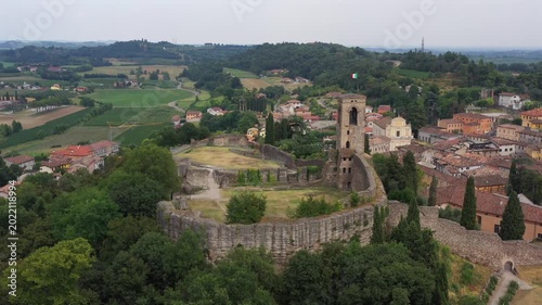 Panoramic shot of the medieval fortress at Cavriana featuring the historic bell tower and rural landscape
