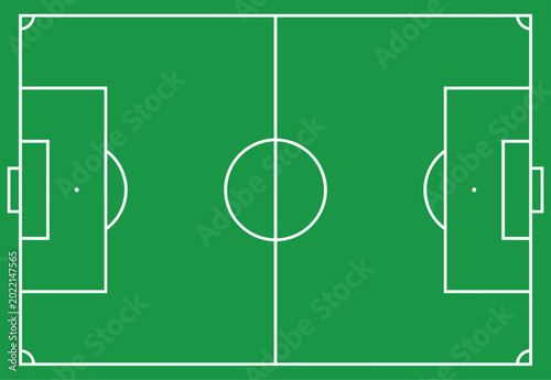 Foto Green soccer field with white lines and goals for football game
