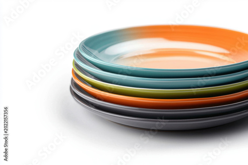 Plate dinner plate colorful plate stack of plate ceramic plate dish tableware kitchenware dining set vibrant color orange plate teal plate green plate gray plate white background clean background