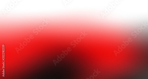Abstract minimalist black wallpaper with intense red light blur
