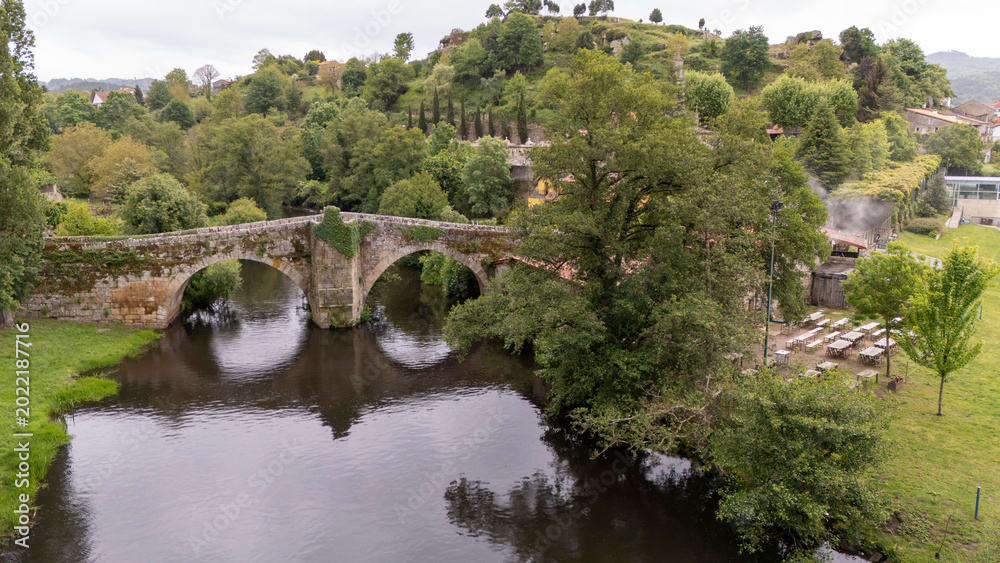 Fototapeta premium Ponte de Vilanova arch bridge spanning Arnoia River in Allariz