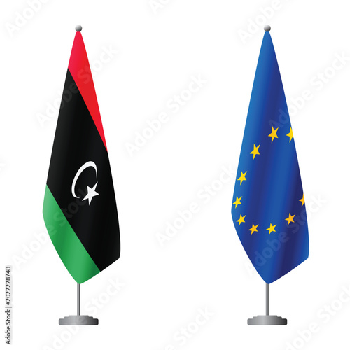 Foto Libya and European Union flags on flagpoles for official ceremonies and meetings