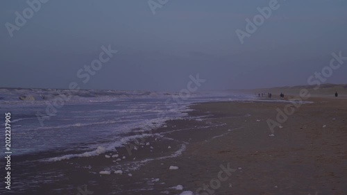 North Sea Waves Crashing on Sandy Beach at Dusk in The Hague